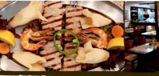 Grillplatte mit Scampi und Steak